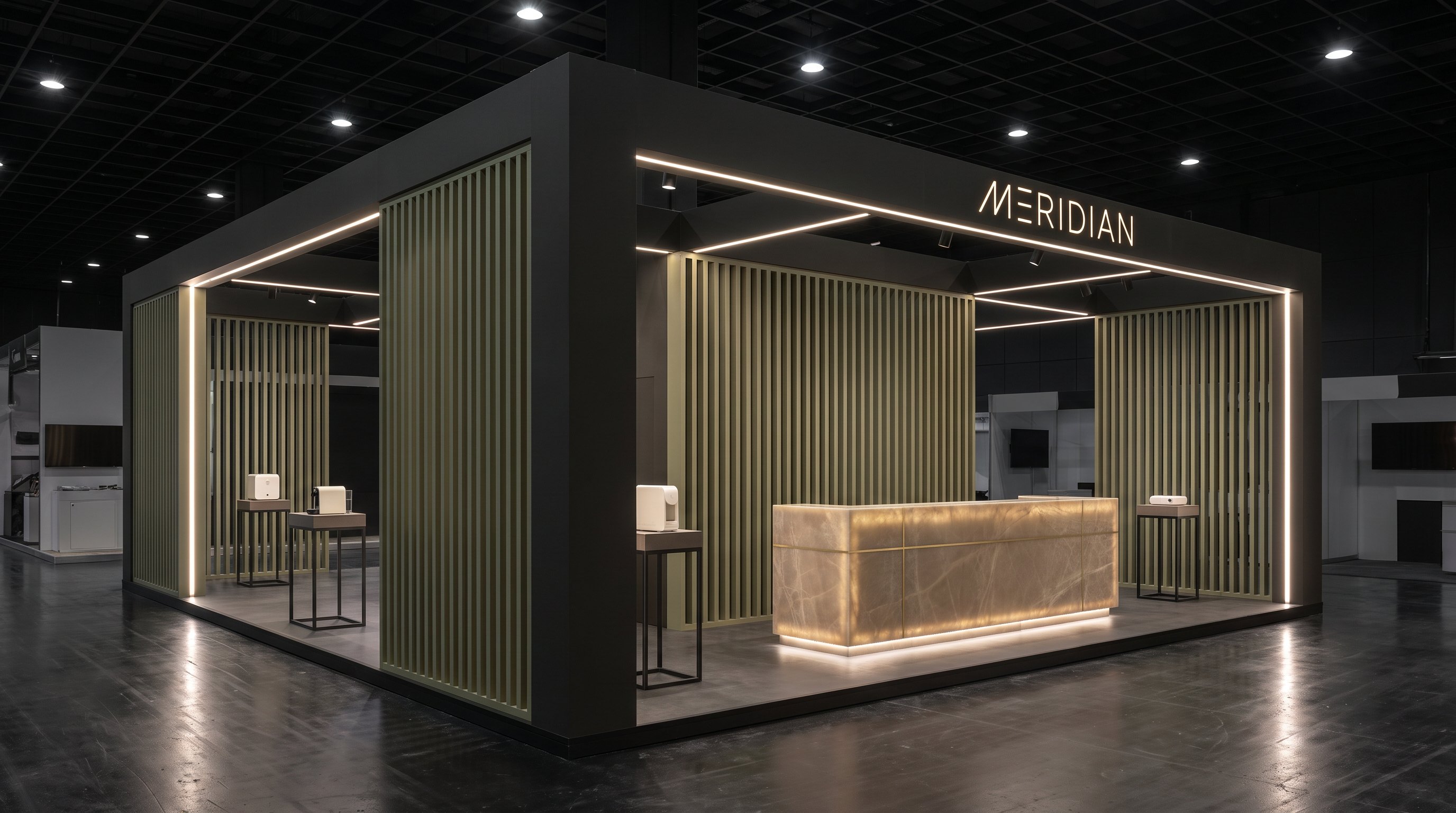 MERIDIAN technology booth with charcoal frame, sage slats and backlit stone counter